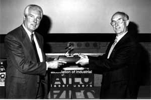 Maurice Gates being presented with his Award