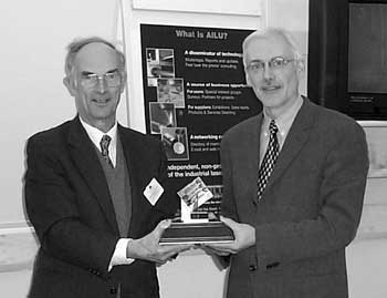 Paul Hilton accepting the Award on behalf of the team